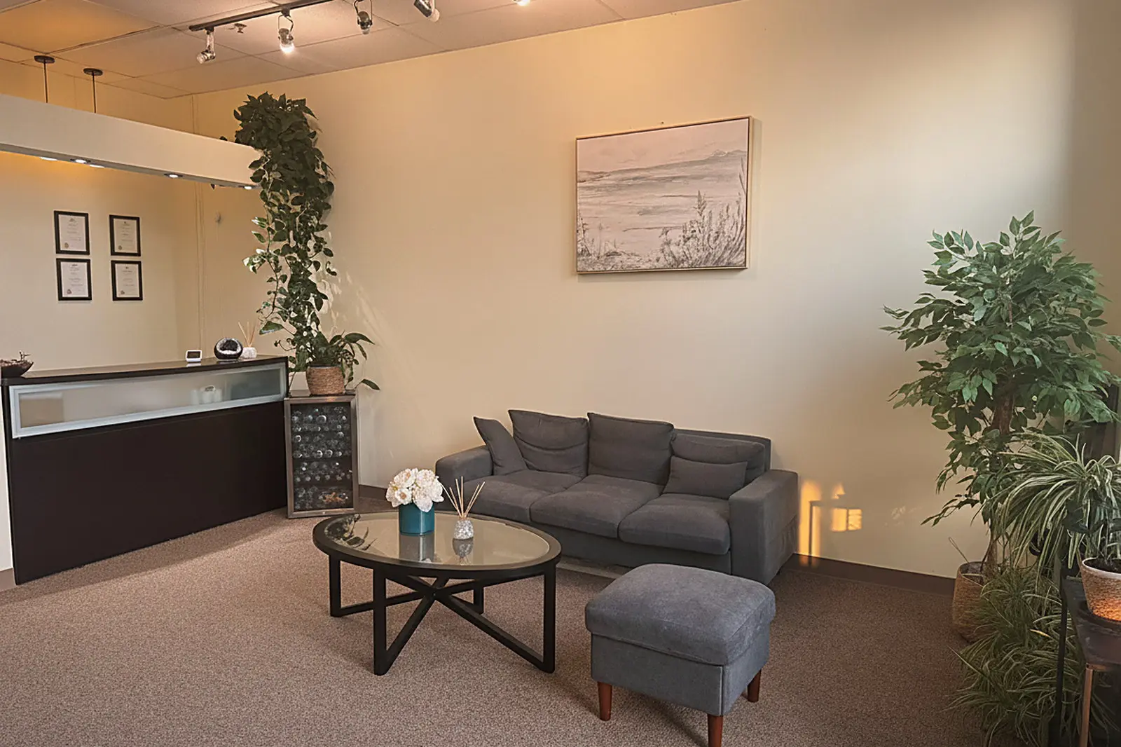 Waiting lounge with armchairs and lamps at Day Massage in Chaska Commons